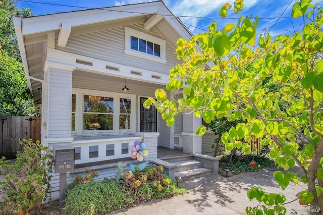 view of front of property featuring covered porch