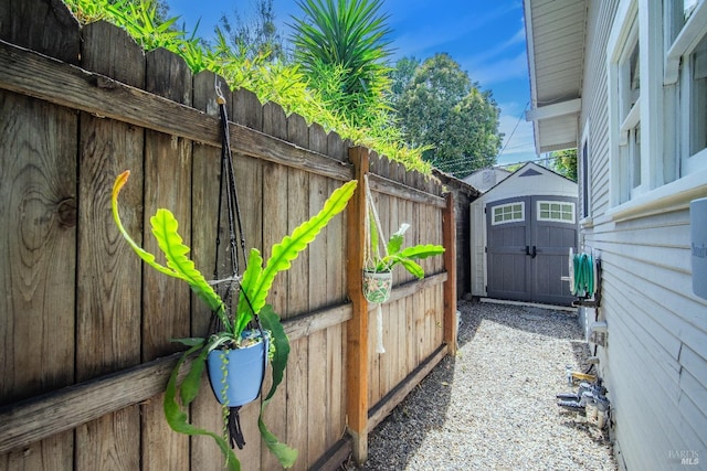 exterior space with a shed