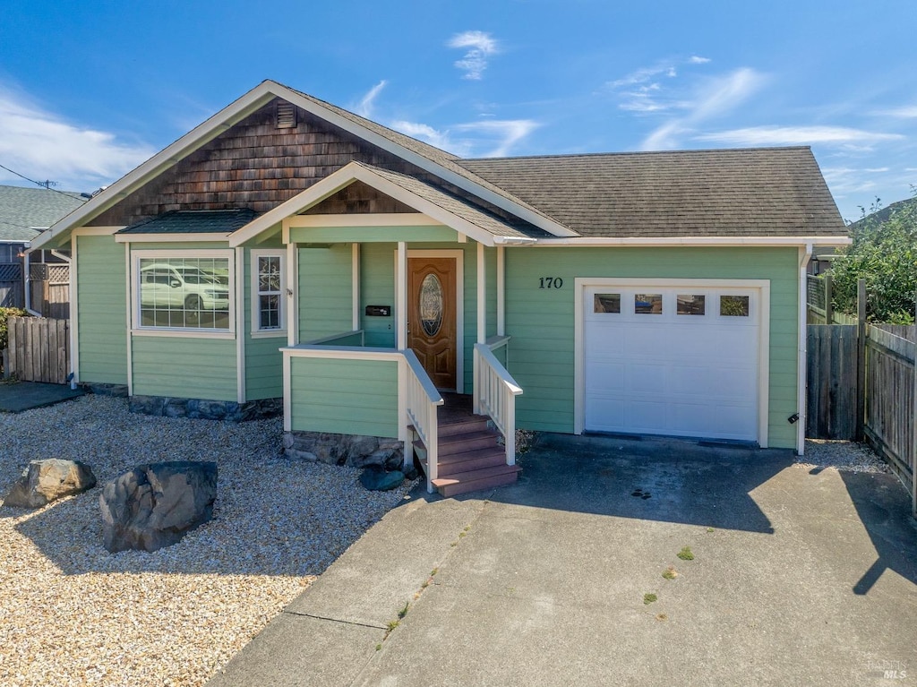 view of front of home with a garage