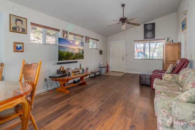 living room with ceiling fan, plenty of natural light, dark wood-type flooring, and lofted ceiling