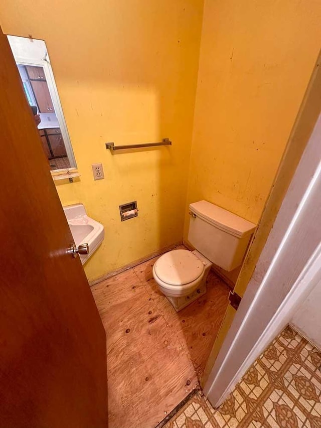 bathroom featuring toilet