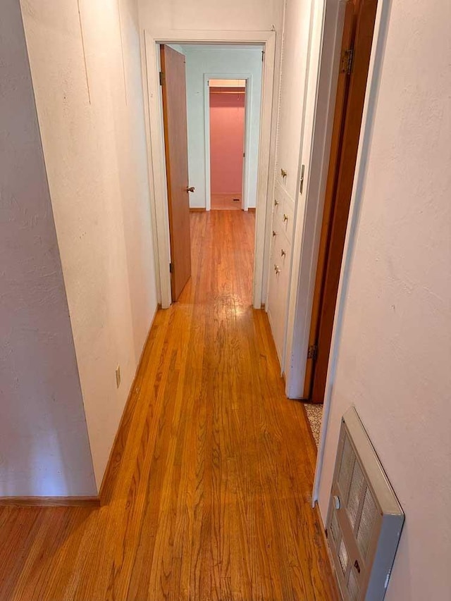 hallway featuring light wood-type flooring