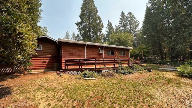 rear view of house with a deck