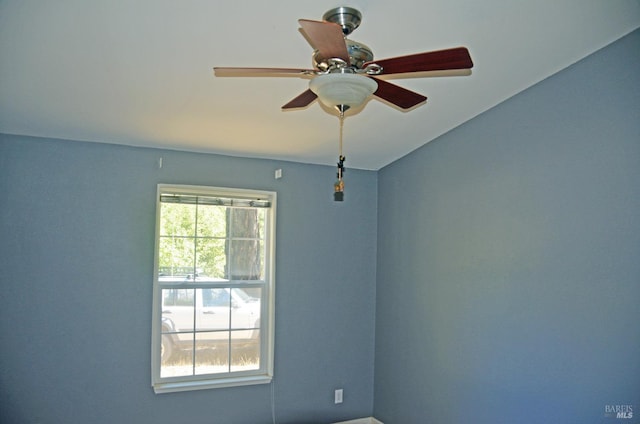 unfurnished room with ceiling fan