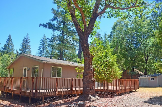 rear view of house with a deck