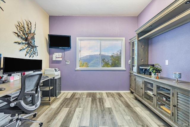 office area with light wood-type flooring