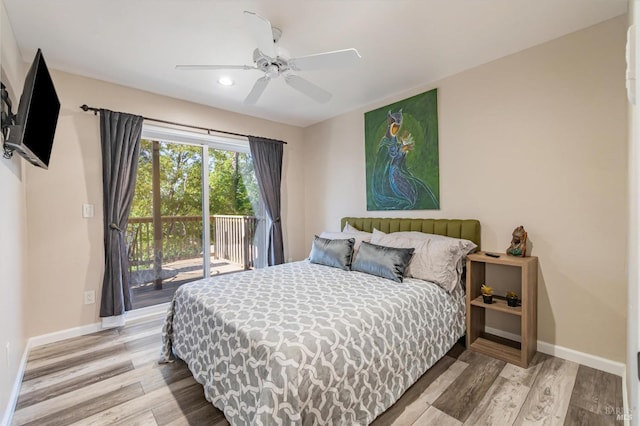 bedroom with ceiling fan, light hardwood / wood-style flooring, and access to exterior