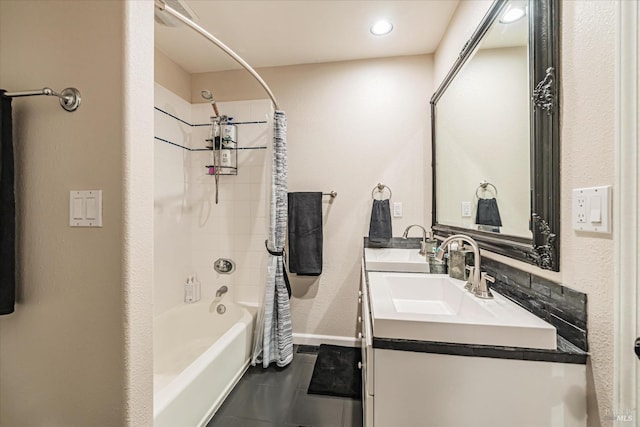 bathroom with vanity and shower / bath combination with curtain