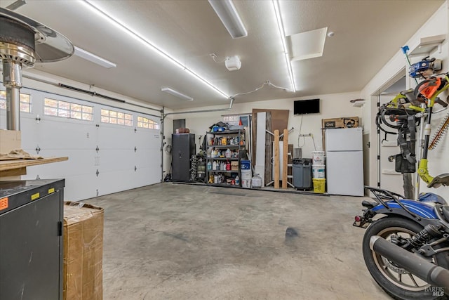 garage with white fridge