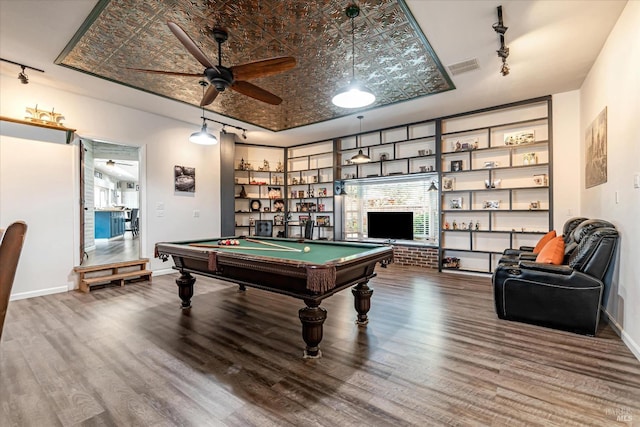 game room with ceiling fan, track lighting, hardwood / wood-style flooring, and billiards