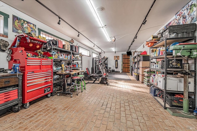 garage featuring a workshop area