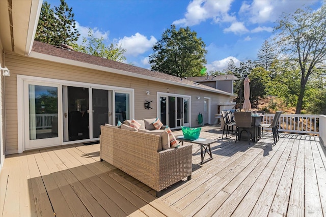 deck with an outdoor hangout area