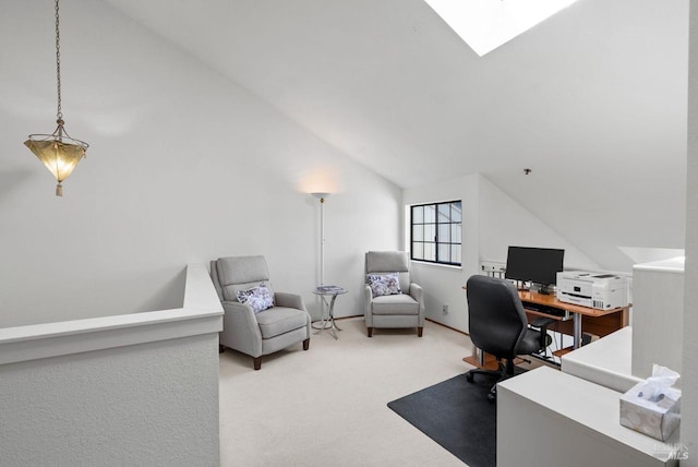 office area featuring carpet floors and lofted ceiling with skylight