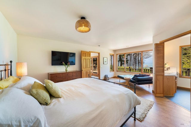 bedroom featuring wood-type flooring