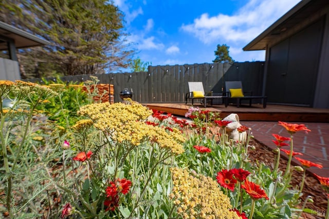 view of yard with a wooden deck