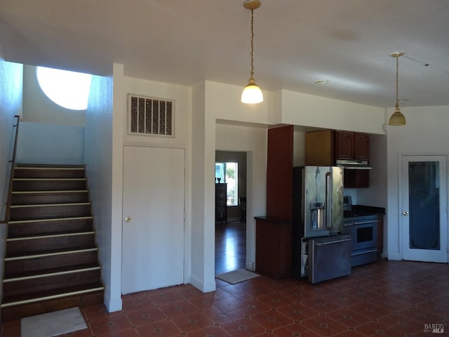 kitchen with decorative light fixtures and stainless steel appliances