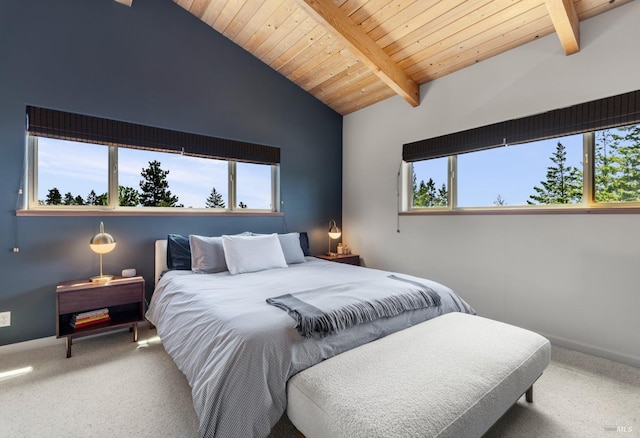 carpeted bedroom with wood ceiling, multiple windows, and lofted ceiling with beams