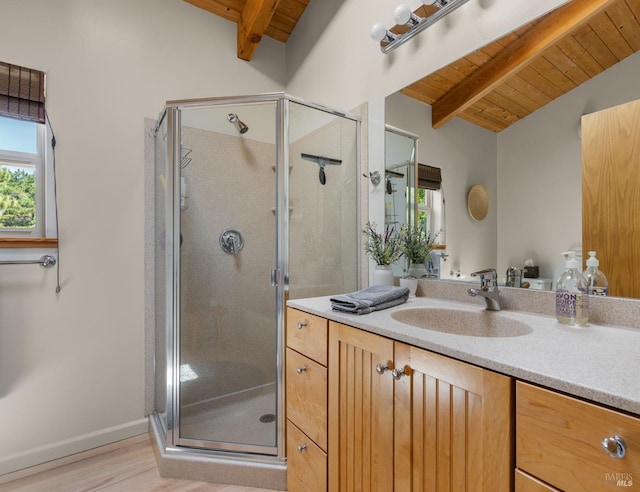 full bath with beamed ceiling, a shower stall, and wood ceiling
