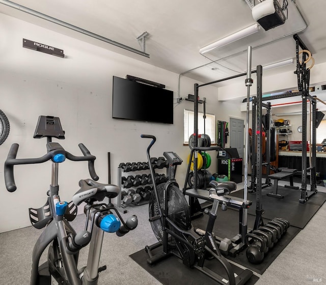 exercise room featuring a garage