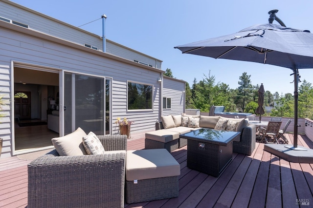 wooden terrace with an outdoor living space