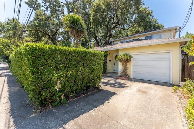 view of front of home featuring a garage