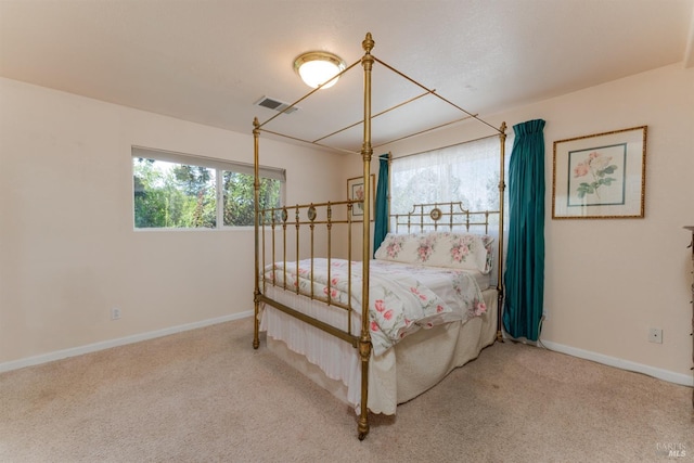 bedroom featuring carpet