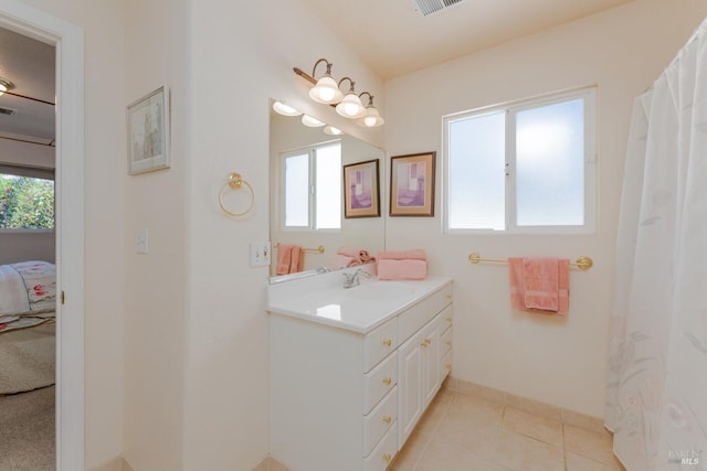 bathroom featuring vanity and tile patterned floors