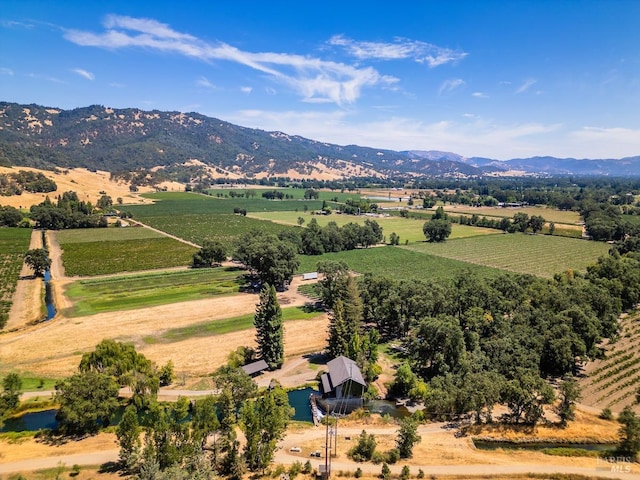 aerial view featuring a rural view and a mountain view