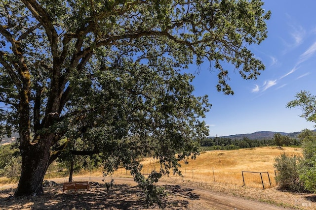 view of mountain feature featuring a rural view