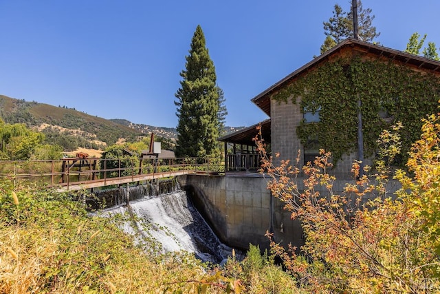 exterior space featuring a mountain view