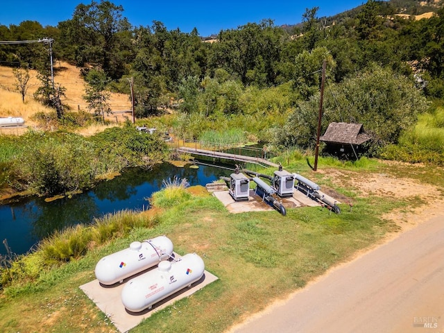 bird's eye view with a water view