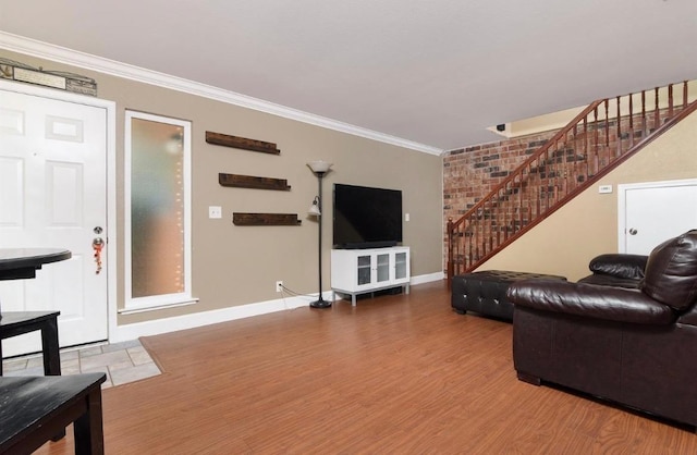 living room with crown molding and wood-type flooring