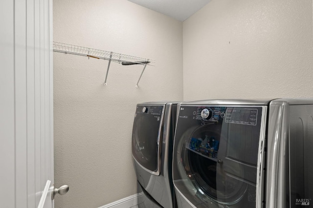 laundry area featuring separate washer and dryer