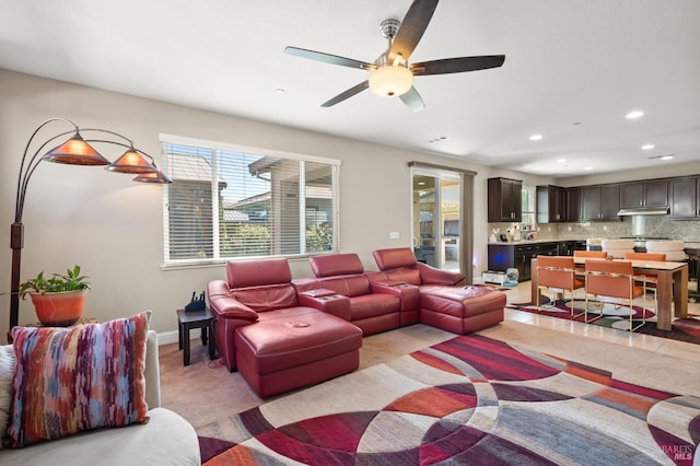 living room featuring ceiling fan