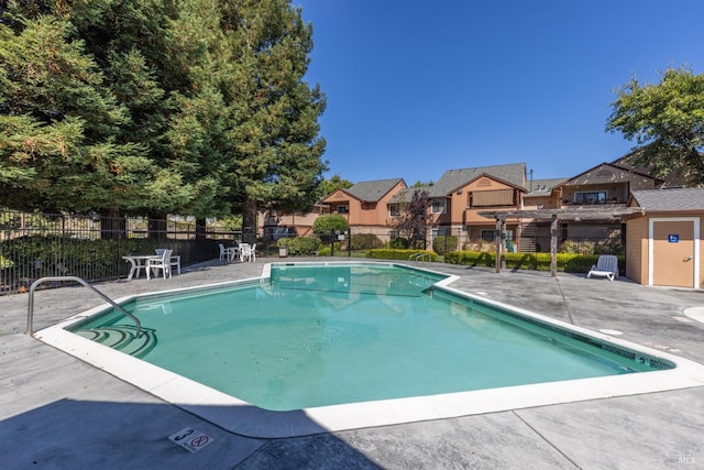 view of pool featuring a patio area