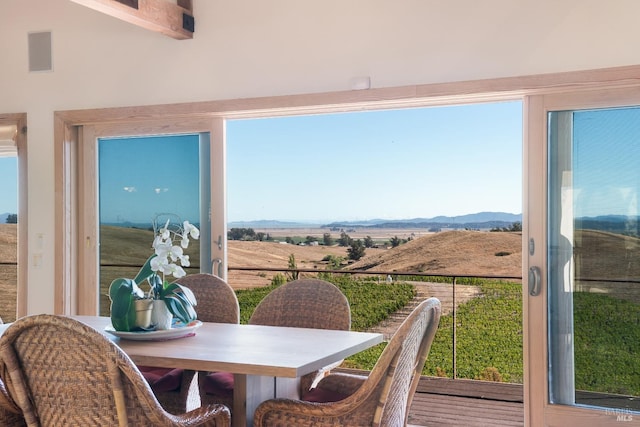 sunroom / solarium with a rural view