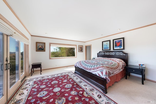 bedroom featuring access to exterior, carpet floors, and ornamental molding