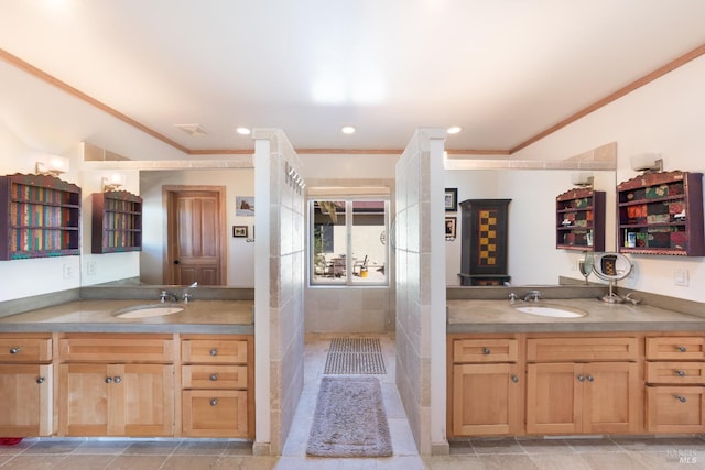 bathroom featuring tile patterned floors, vanity, and crown molding