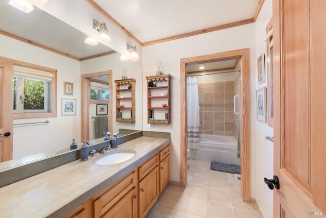 full bathroom with crown molding, shower / bath combo with shower curtain, vanity, and toilet