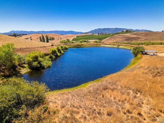 water view featuring a mountain view and a rural view