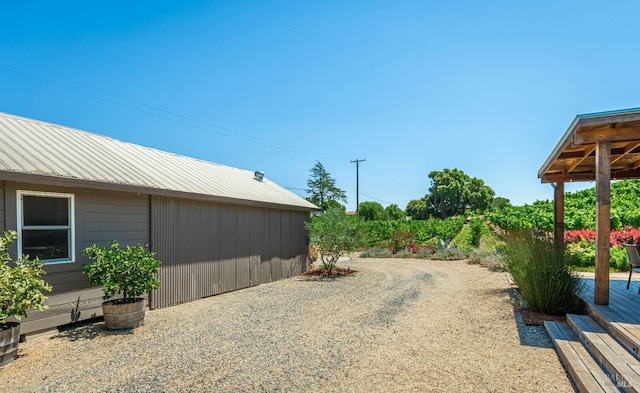 view of yard featuring a wooden deck