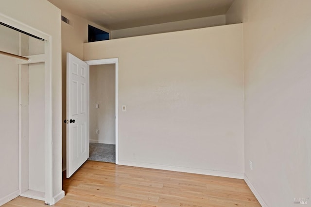 unfurnished bedroom with light hardwood / wood-style flooring