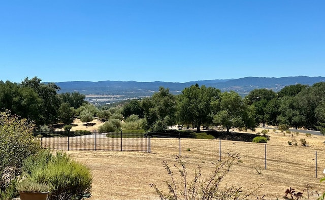 mountain view featuring a rural view