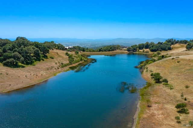 aerial view with a water and mountain view