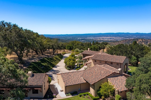 drone / aerial view featuring a mountain view