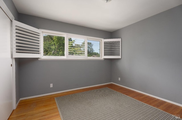 unfurnished room featuring light hardwood / wood-style floors