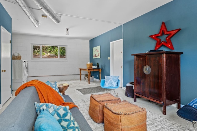 sitting room featuring washer and dryer