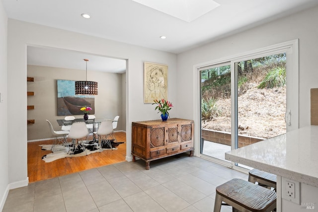 interior space featuring a skylight