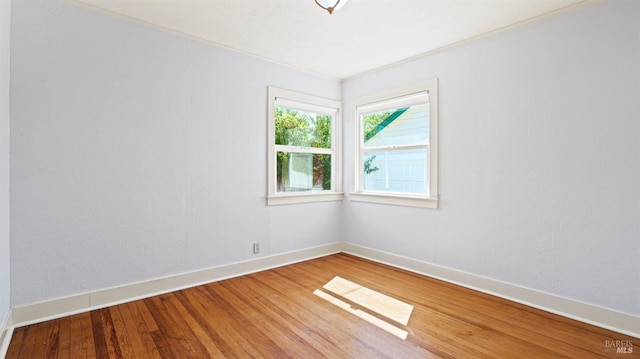 empty room with light wood-type flooring