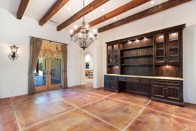 interior space with beamed ceiling and a chandelier